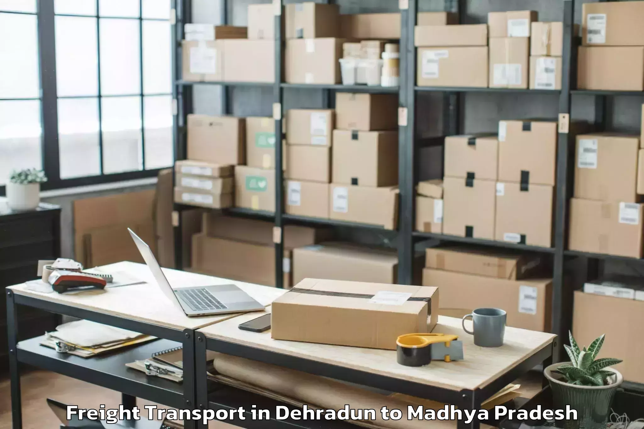 Quality Dehradun to Gautampura Freight Transport